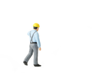 Miniature people engineer worker construction concept