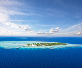 Fototapeta na wymiar Beautiful small tropical island on Maldives