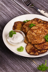 Liver Patties with Sour Cream and Parsley. Liver Cakes or Fritters of Liver. Healthy snack or take-away lunch bites.