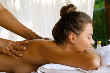 Woman during traditional Thai massage © blackday
