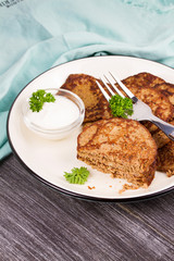 Liver Patties with Sour Cream and Parsley. Liver Cakes or Fritters of Liver. Healthy snack or take-away lunch bites.