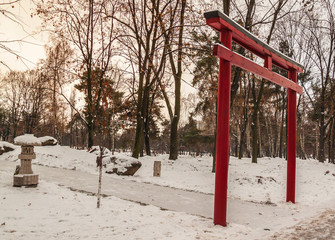 Red torii in a Japanese garden in Kiev