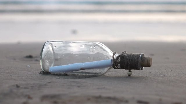 High quality video of message in the bottle on the beach in real 1080p slow motion 250fps.  More videos from this series in my portfolio