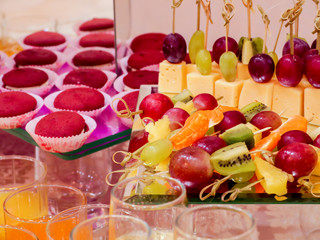 Fototapeta na wymiar Fruits and desserts on the Banquet table. Buffet. Catering.