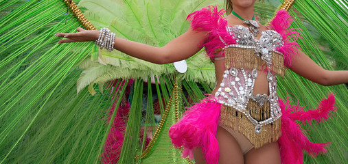 A woman in costume dancing on carnival