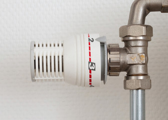 Temperature knob of heating radiator, used and dusty