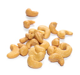 Unshelled roasted cashew nuts isolated on white background


