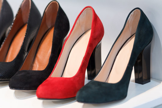 Women's high-heeled shoes on the counter closeup