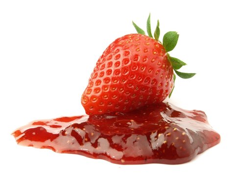 Strawberry jam with berry on white background