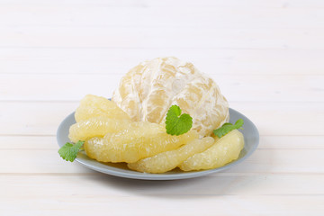 peeled and sliced pomelo