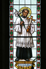 Saint Aloysius stained glass window in Parish Church of Saint Roch in Kratecko, Croatia on July 16, 2010.