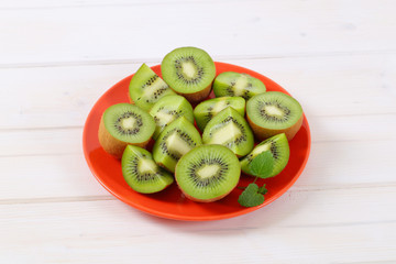 plate of kiwi halves and quarters