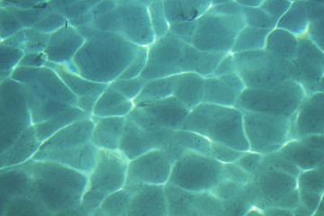 Turquoise color sea surface with sand ground in Bodrum / Turkey.