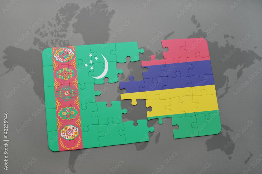 Wall mural puzzle with the national flag of turkmenistan and mauritius on a world map - Wall murals