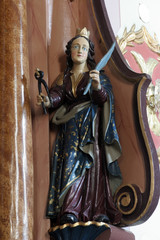 Saint Apollonia statue on the altar in Parish Church of Saint Martin in Martinska Ves, Croatia on June 03, 2011.