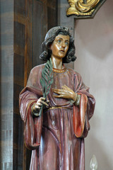 Saint Joseph holding baby Jesus statue at the altar in the Parish Church of Saint Joseph in Sisljavic, Croatia on August 23, 2011.