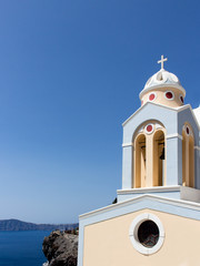 Bells tower closeup of a church in Santorini, Greece.