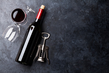 Red wine glasses and bottle