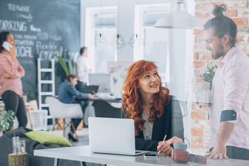 Woman flirting with coworker