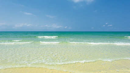 Beautiful gentle wave and bright water at the tropical beach