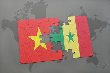 puzzle with the national flag of vietnam and senegal on a world map