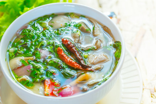 Hot and Spicy Thai food, pork tom yam or soup.