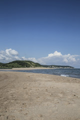 Fototapeta na wymiar Empty sandy beach of an island