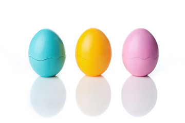 Colored Eggs over a white background