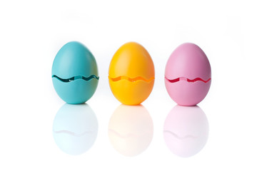 Colored Eggs over a white background