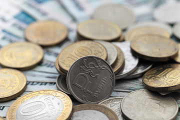 Russian coins on a background of paper money