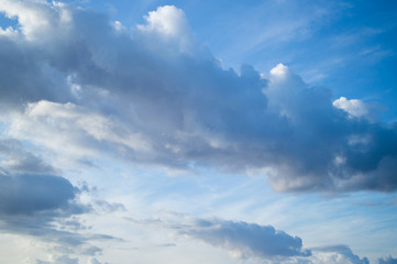 Beautiful light cumulus clouds in the blue sky. Niñe background for your collection.