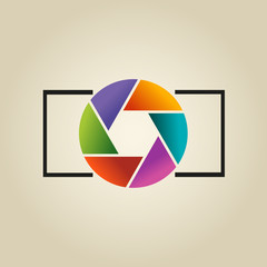 Multi-colored vector logo in the form of lens and diaphragm of photoappar on light background