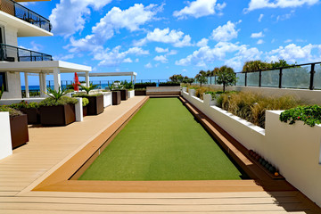 Beautiful, upscale bocce ball court on artificial turf.