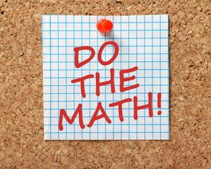 The words Do The Math in red text on a piece of squared graph paper pinned to a cork notice board...