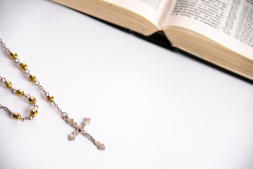catholic background with rosary and bible