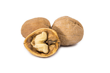 group of walnuts isolated on white background. One opened.