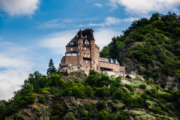 Fototapeta na wymiar An old castle in the hillside on the Rhine
