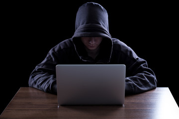Anonymous hacker in the dark