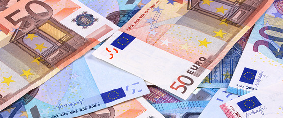 Euro Money Banknotes Different denominations abstract background.