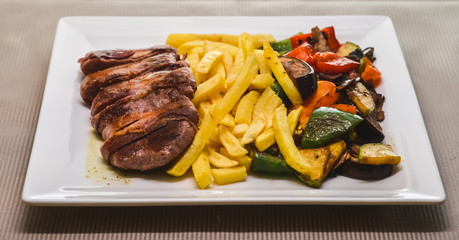 Grilled meat with potatoes