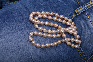 Jeans and Pearl Necklace