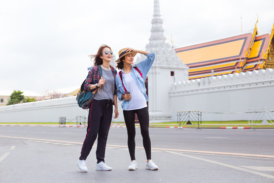 Two girlfriends traveling to Grand- Palace in Bangkok,Thailand 
