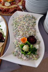 Classic Croatian plate with fine salad with ham