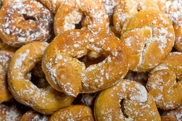 fried donuts of Spain made with dough of flour , yeast, milk, eggs,oil, orange, anise and sugar