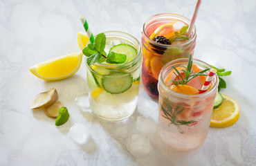 Fruit refreshing water. Summer cold drinks with blackberries, grapefruit, lemon and mint. The concept of healthy and dietary nutrition.