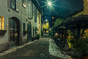 Old medieval street in Milan at night - 1