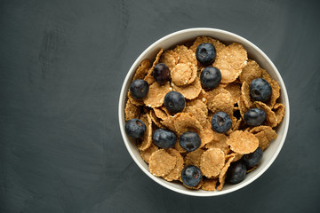 Healthy food. Multi grain flakes with blueberry for breakfast