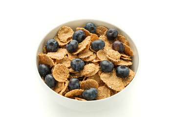 Healthy food. Multi grain flakes with blueberry and for breakfast. Close-up.