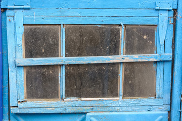 Close up old blue wooden frame window