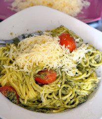 Italian food spaghetti with basil sauce. Vegetarian food. 